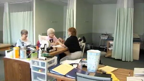 Chinese Bell ; A large bell inscribed with Chinese characters.