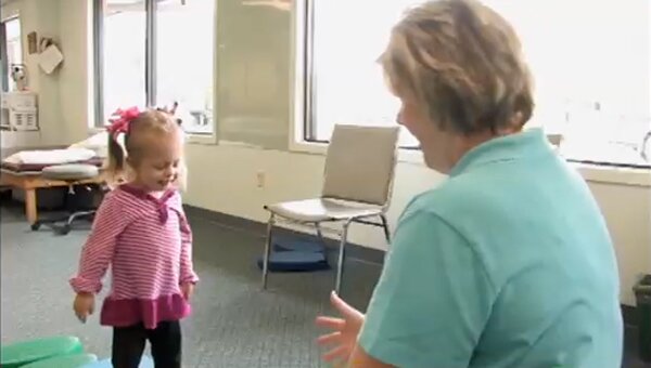 Chinese Bell ; A large bell inscribed with Chinese characters.
